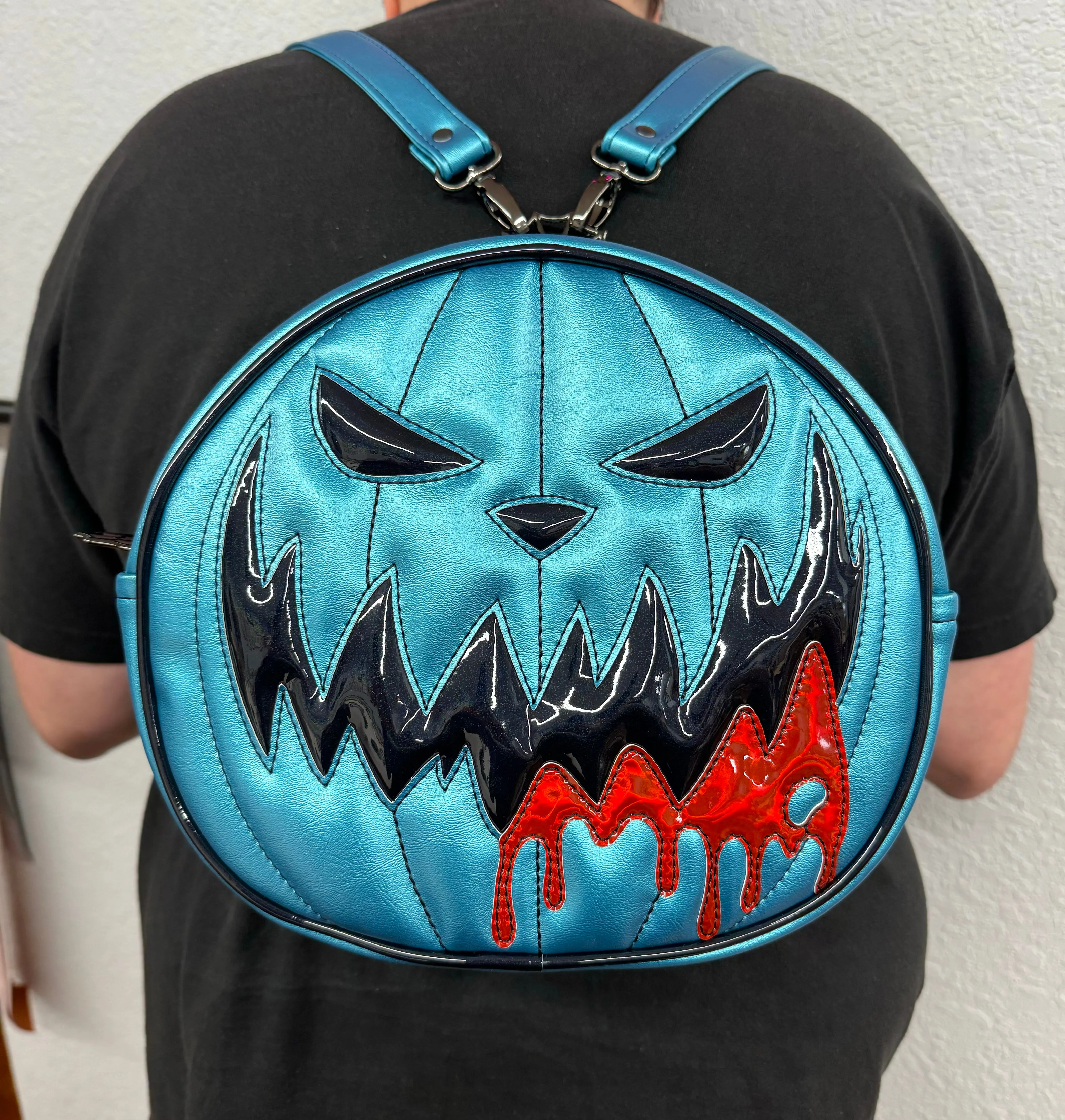 Turquoise Pearl Mean Face Ooze Backpack - Oil Slick Holo Glitter, Red Holo - *PRE-ORDER